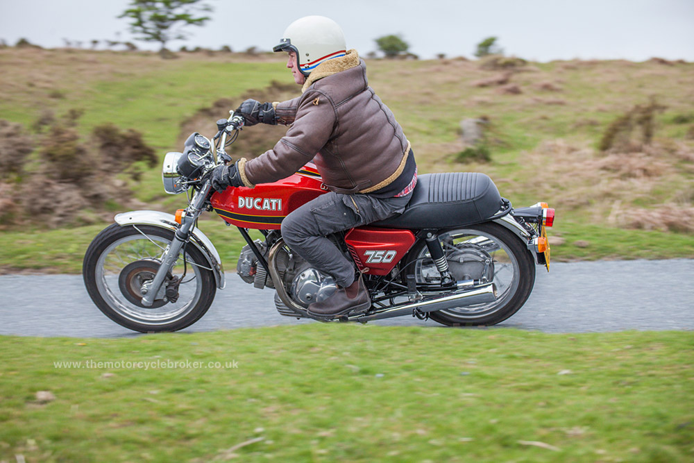 1973 Ducati GT750 sparkle red mid corner LHS 1